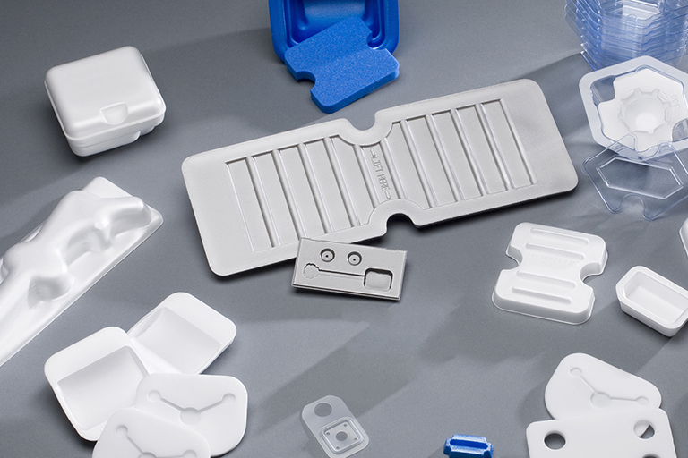 Compression Molded Medical Packaging and Components