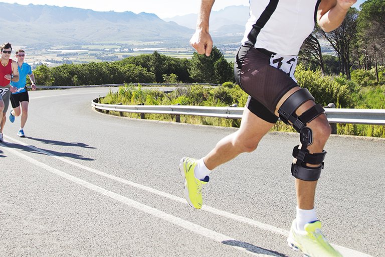 Running Man With Knee Brace Medical Wearables