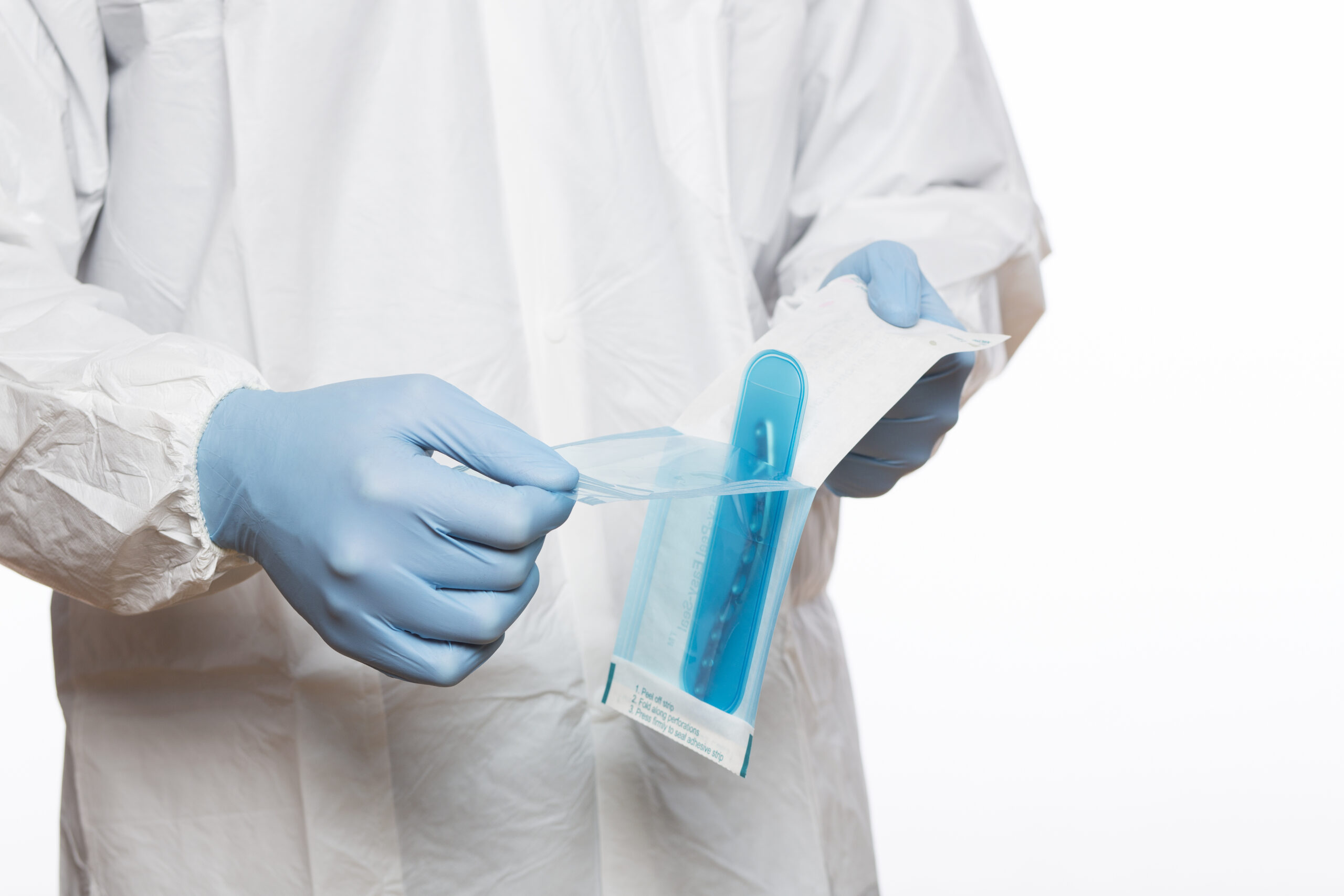 Medical Professional displaying sterile packaging